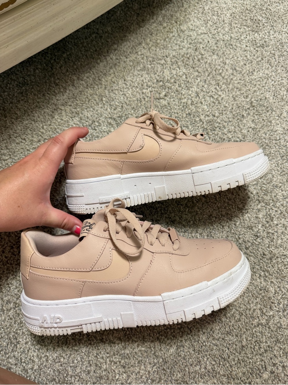 Nike Women’s Light pink Beige Leather Low-Top Sneakers